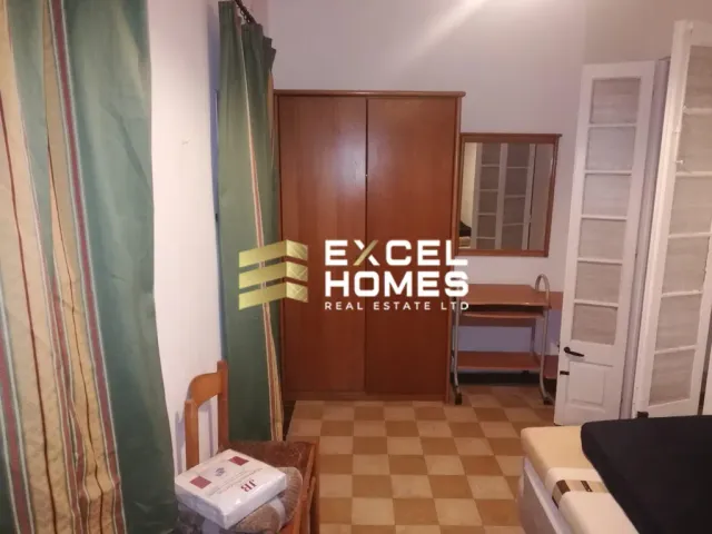 a room with a door open and a door open 