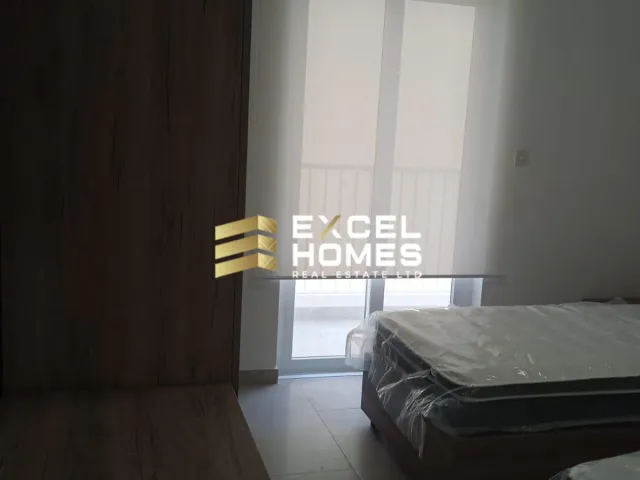 a banana is hanging from a bed