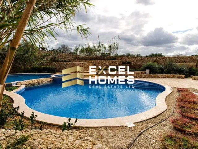 a pool with a blue and white pool table and a blue and white swimming pool