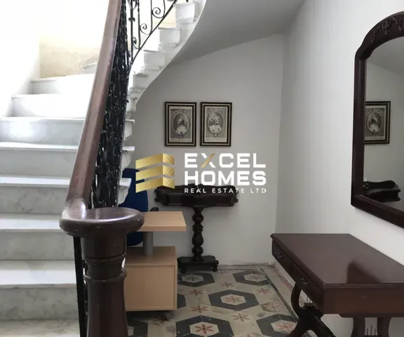 a stair case with a picture of a man on it