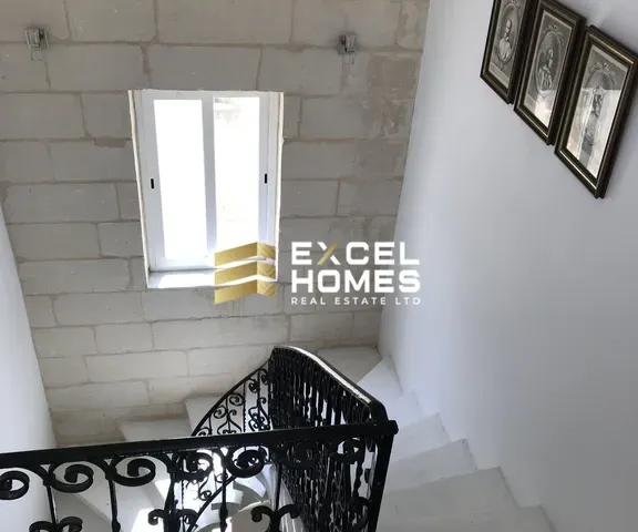 a white and blue wall with a white and blue door