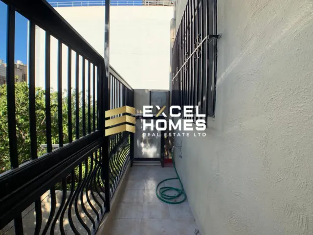 a view from a balcony of a building with a balcony