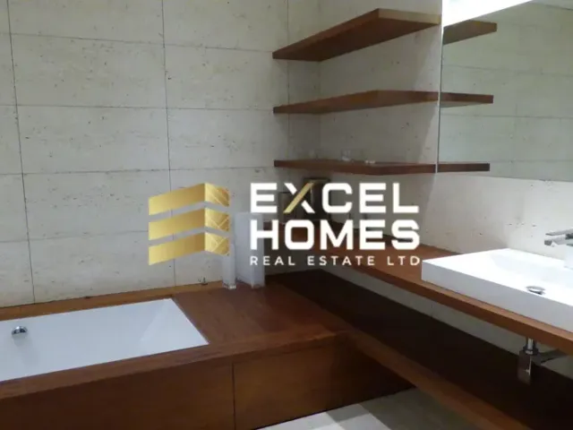 a bathroom with a sink, toilet and bathtub 