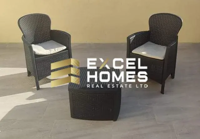 a chair and a table with chairs