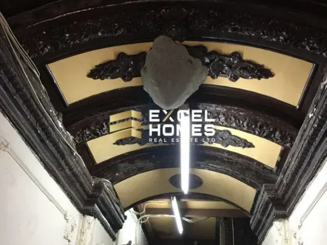 a large clock on a wall in a building