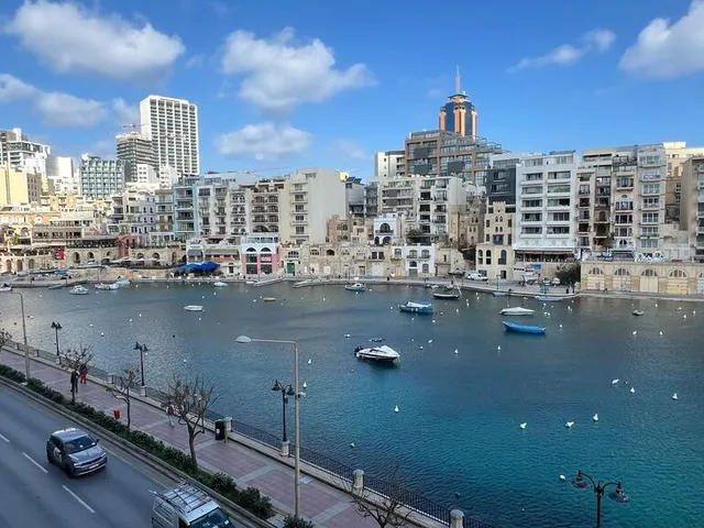 a city with a lot of boats in the water