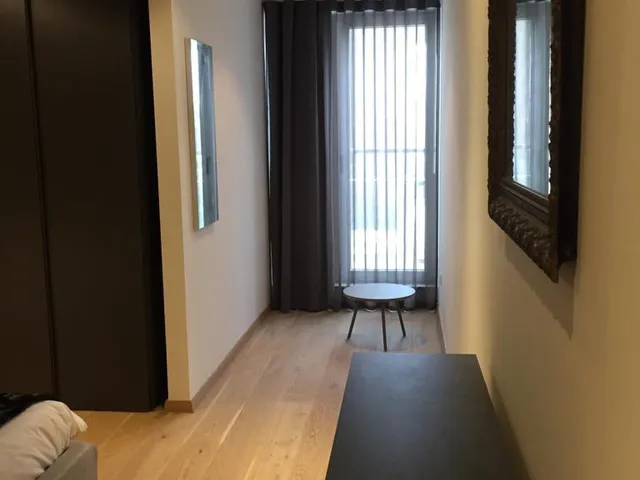 a room with a window and a door