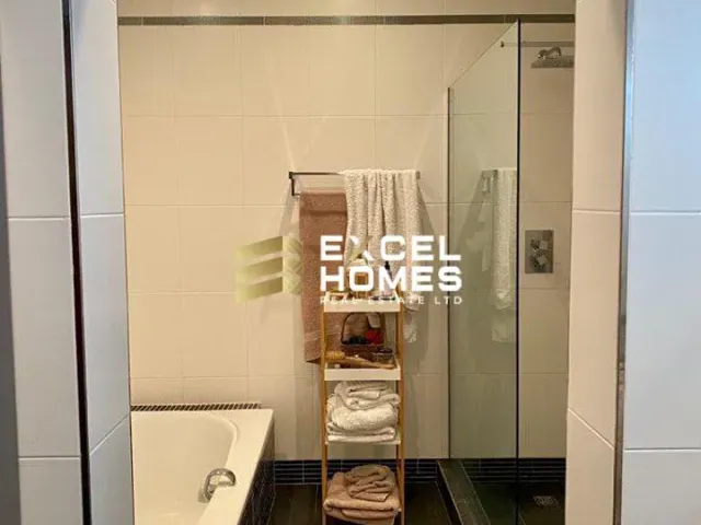 a bathroom with a toilet and a sink 