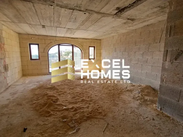 a room with a brick wall and a brick wall