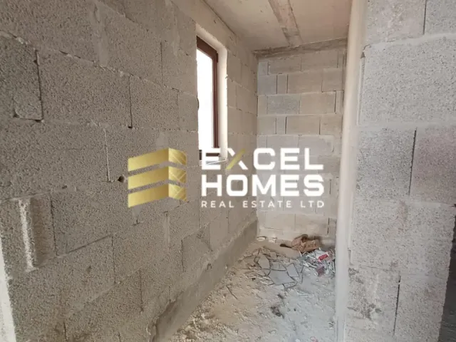 a wall with a broken down door and graffiti on it