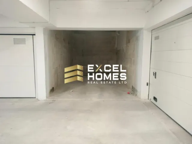 a room with a wall with a wall of toilet paper