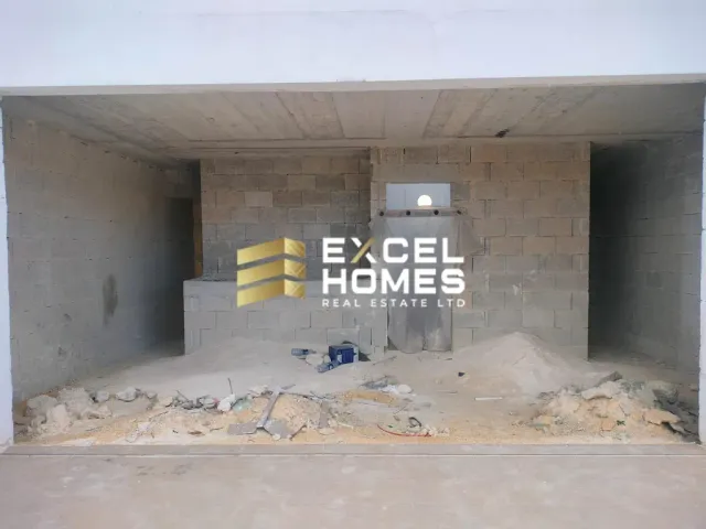 a wall with a broken down building and a broken down wall