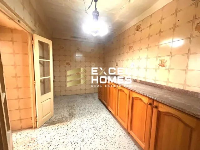 a bathroom with a sink and a door 