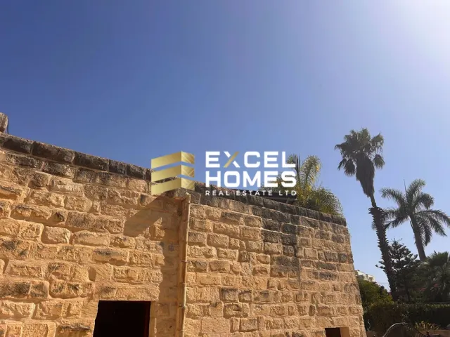 a building with a clock on the side of it