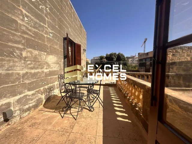 a bike parked in front of a wooden door