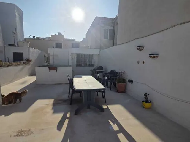 a table with a table top and a chair