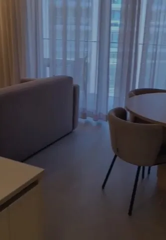 a living room with a couch and a table