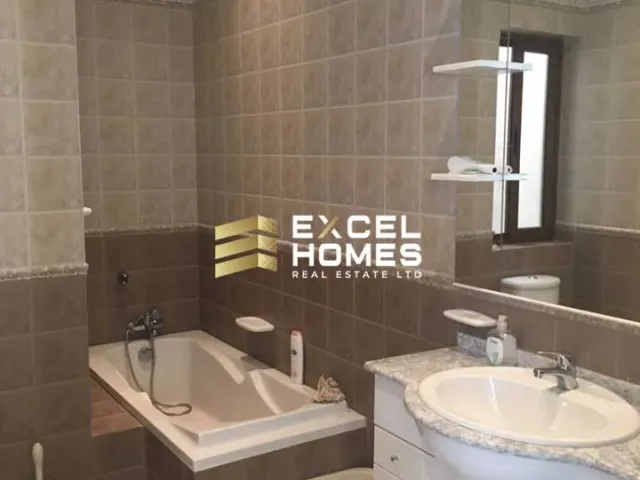 a bathroom with a sink, toilet and bathtub