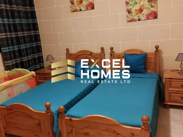 a bed room with a bed and a desk